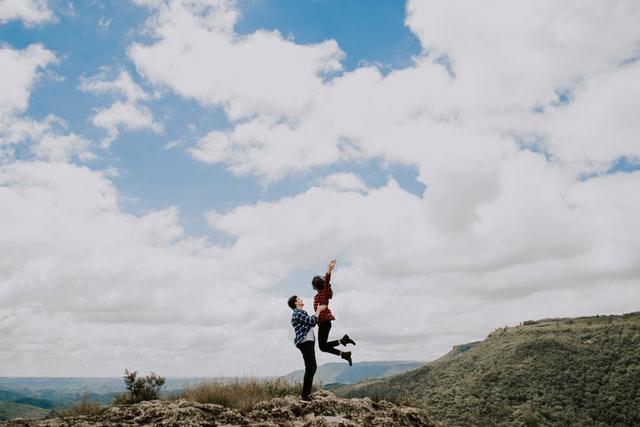 couple on a hill
